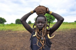 Mursi Tribe  by Rod Waddington