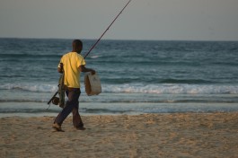 Tofo Mozambique beach & fisherman  by Emilio