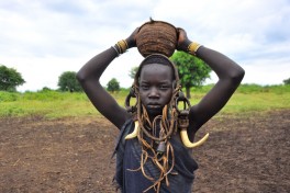 Mursi tribe in mago  by Rod Waddington