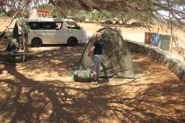 Safari Vehicle at Camp Site 
