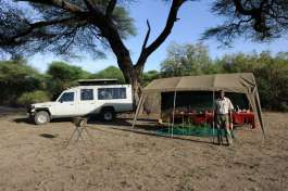 Mobile camp dining set up and Tour Vehicle 