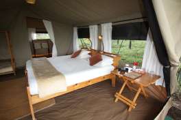 Serengeti wilderness camp tent interior 