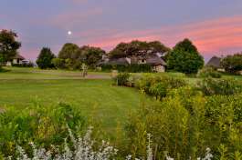 Montusi mountain lodge gardens and moon rise 