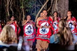 Stone camp staff doing traditional dancing for guests 